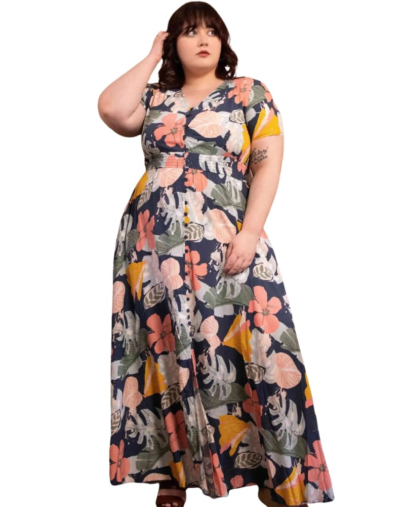 Front of a model wearing a size XL Kimberly Maxi Dress Floral Print Navy in Navy by ANNICK. | dia_product_style_image_id:300517